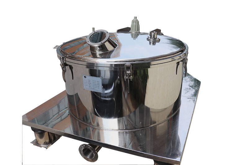 Top discharge centrifuge